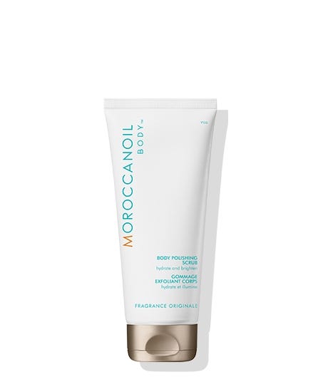 Reveal renewed, brighter-looking skin with Body Polishing Scrub. This revitalizing gel-based scrub contains argan shell powder and lava stone pumice to gently buff away dead surface cells and a nourishing blend of six precious oils—argan, avocado, rice bran, safflower, grape seed, and sweet almond—to leave skin irresistibly soft and smooth. Fragranced with the signature Moroccanoil scent, a Mediterranean-inspired blend of spicy amber and warm florals. 